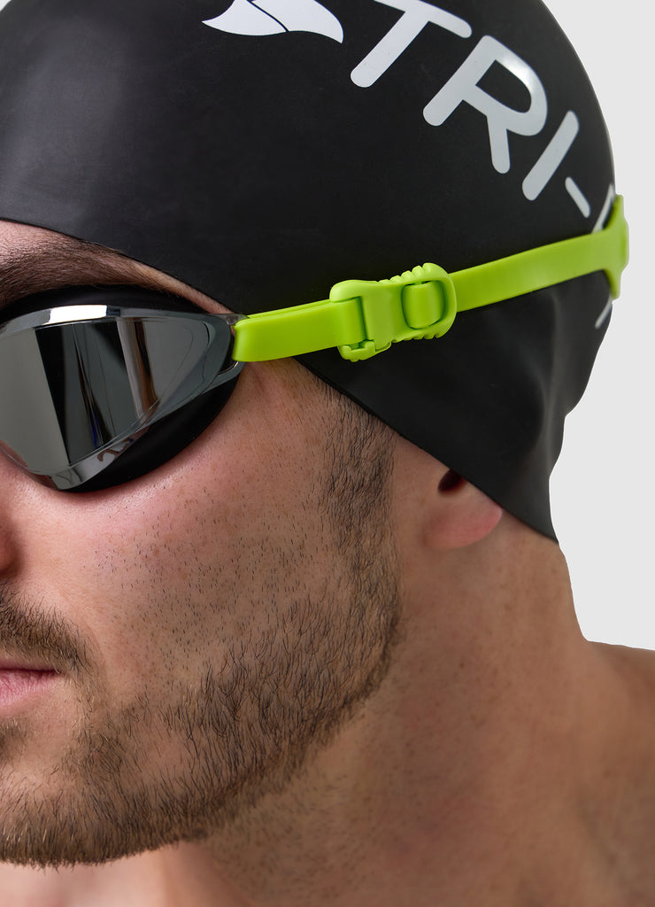 TRI-FIT VOLT swim goggles with black and blue frame and silver mirrored lenses on a white background. 220 Triathlon Best on Test & TRI247 95%