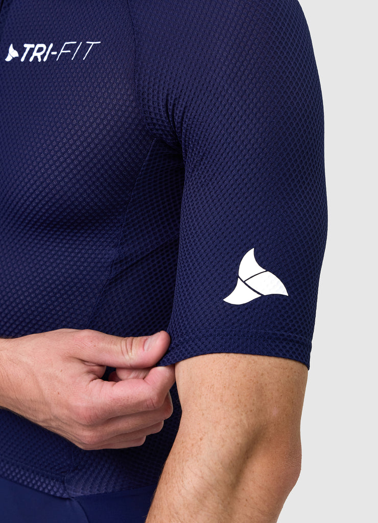 White TRI-FIT logo printed on navy mesh sleeve of VANGUARD tri-suit, with laser-cut hem