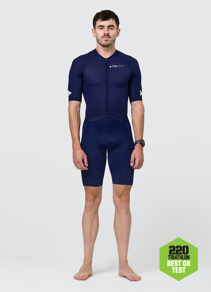 Front view of TRI-FIT men’s VANGUARD tri-suit in navy, featuring full-length zip and breathable upper. 220 BEST ON TEST.