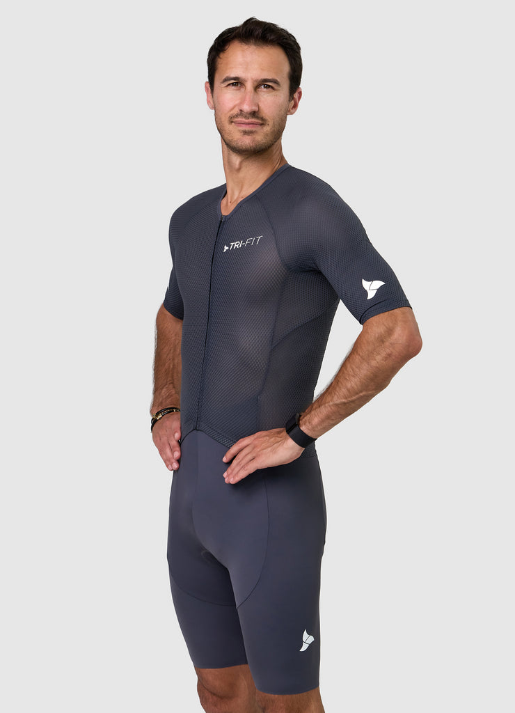 Side profile of men’s VANGUARD tri-suit in grey, showing ergonomic fit and full-body construction