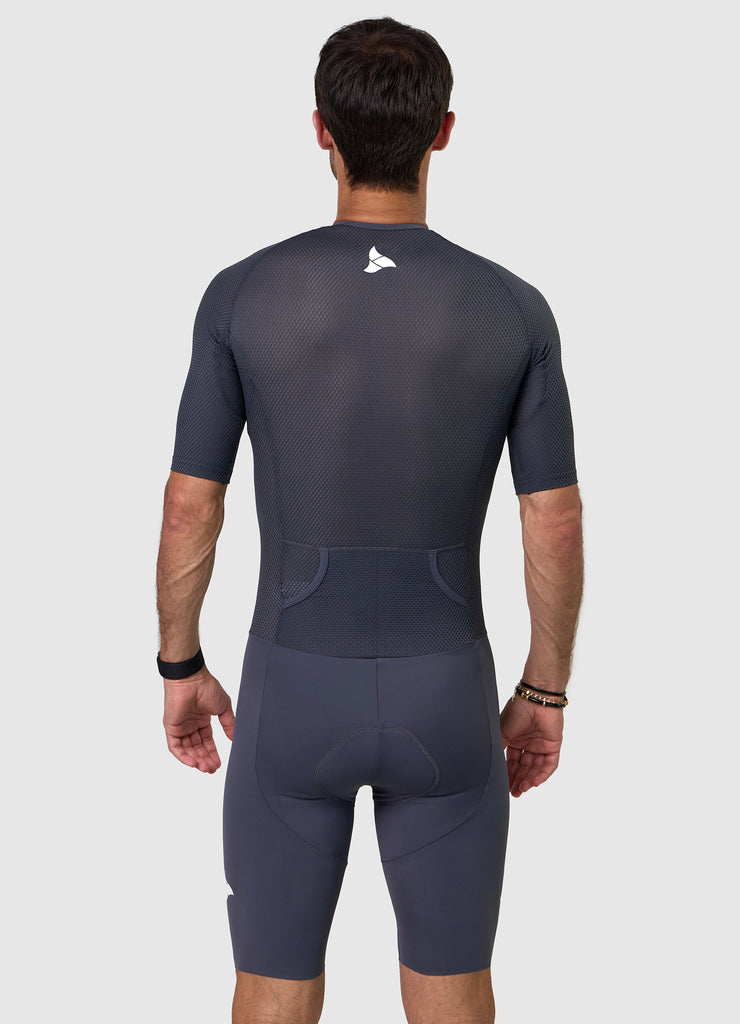 Back view of men’s VANGUARD tri-suit in grey, showing dual rear pockets and anatomical panel layout