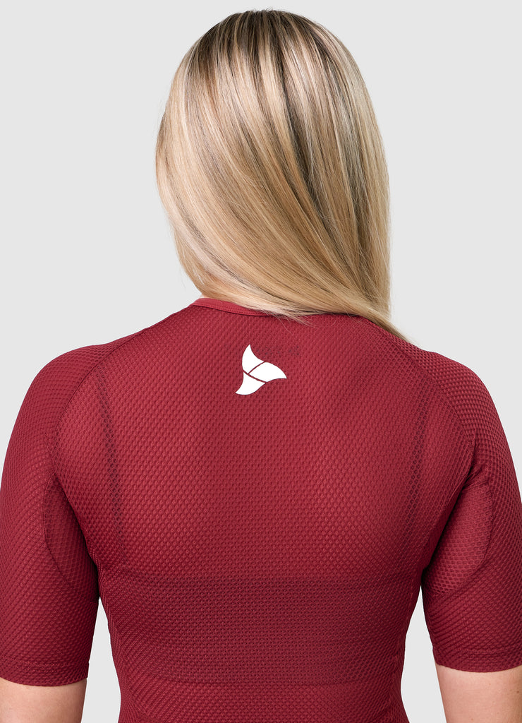 Rear neckline of VANGUARD tri-suit featuring white TRI-FIT logo on breathable mesh fabric