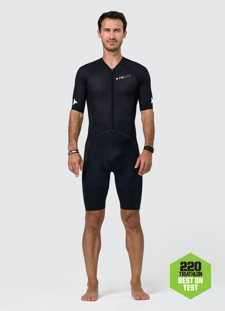 Front view of TRI-FIT men’s VANGUARD tri-suit in black, featuring full-length zip and breathable upper. 220 BEST ON TEST