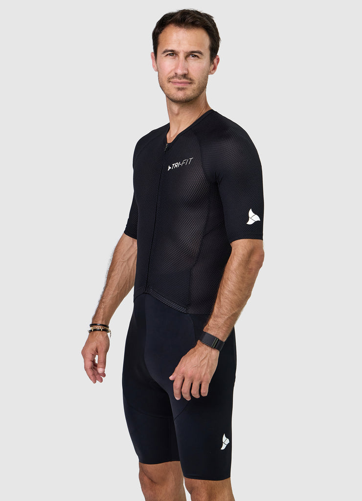 Side profile of men’s VANGUARD tri-suit in black, showing ergonomic fit and full-body construction