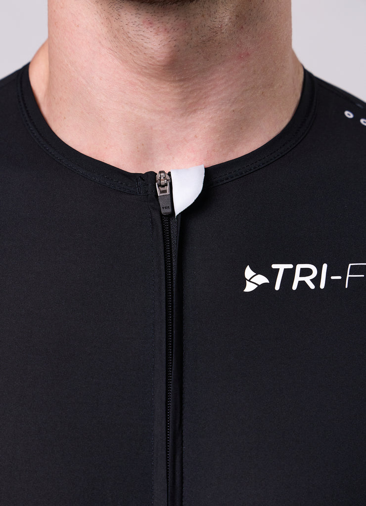 TRI-FIT chest logo detail on VORTEX BLACK EDITION Tri-Suit – premium race suit branding