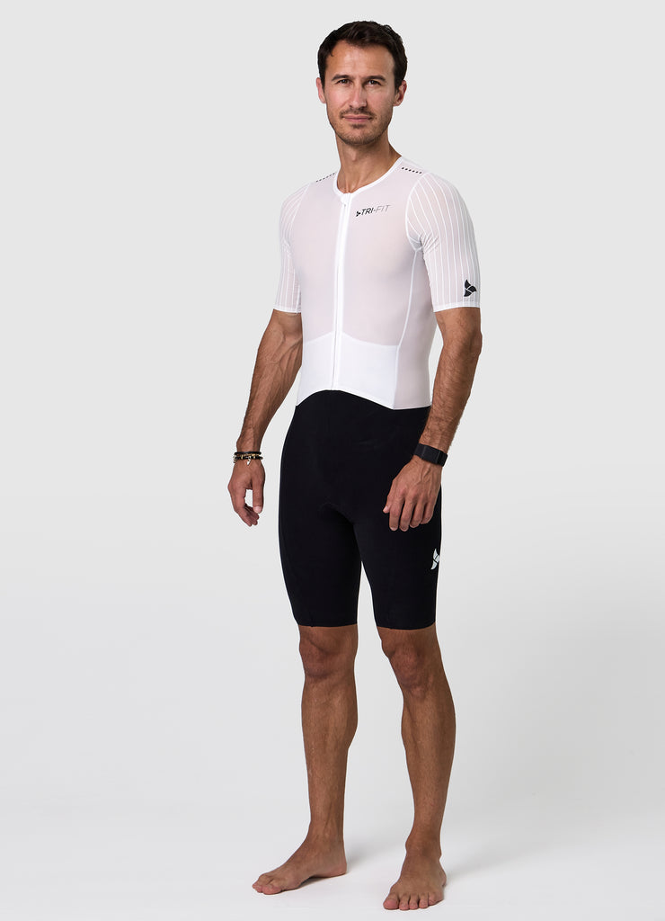 Side view of the men's white/black VORTEX triathlon suit showcasing aero sleeves and race cut