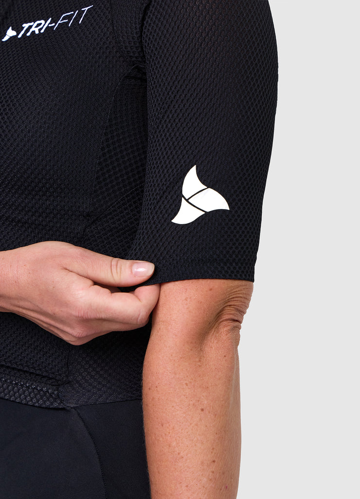 TRI-FIT logo printed on sleeve of VANGUARD tri-suit in black, showing laser-cut finish