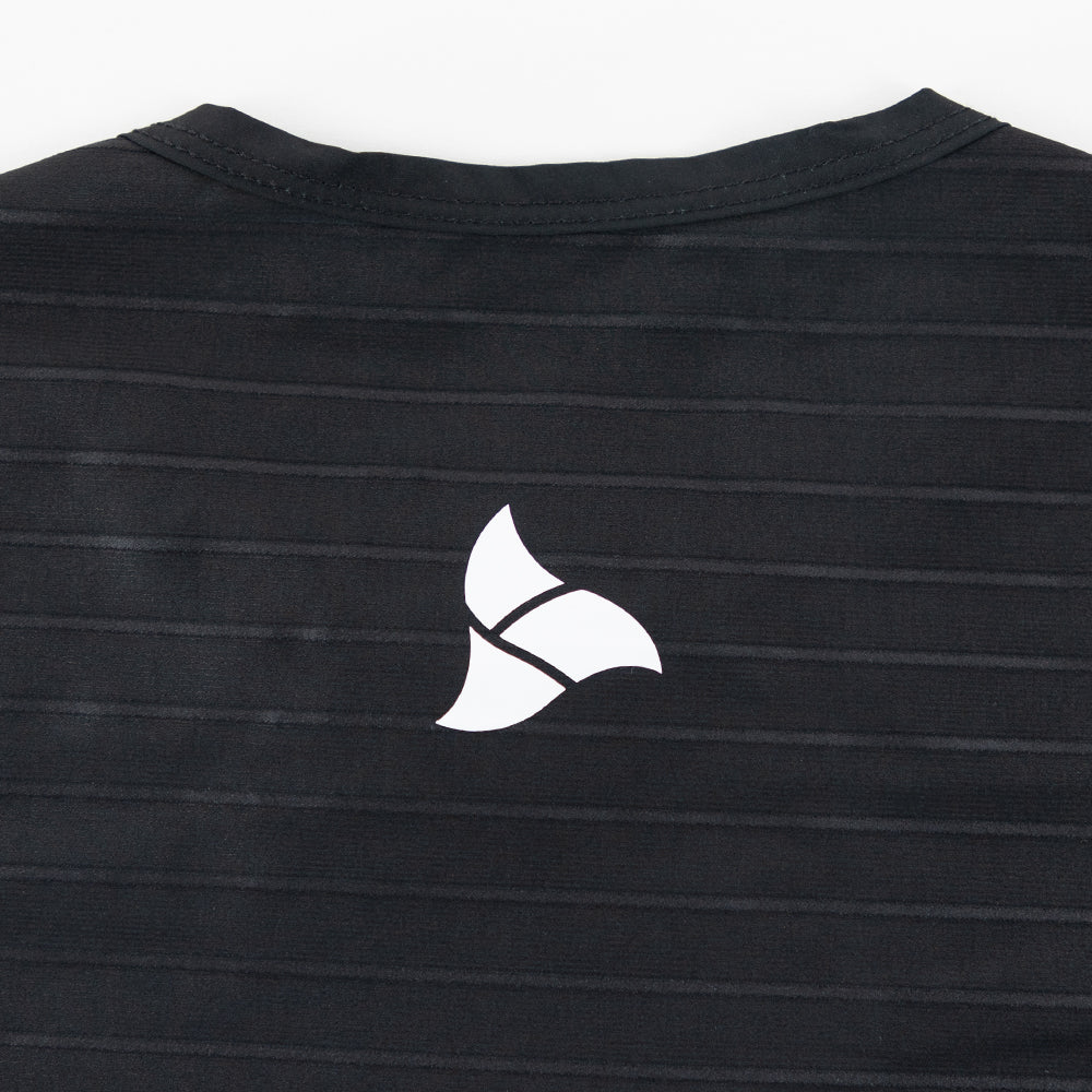 TRI-FIT logo detail on rear of VORTEX BLACK EDITION Tri-Suit – close-up of ribbed aero fabric