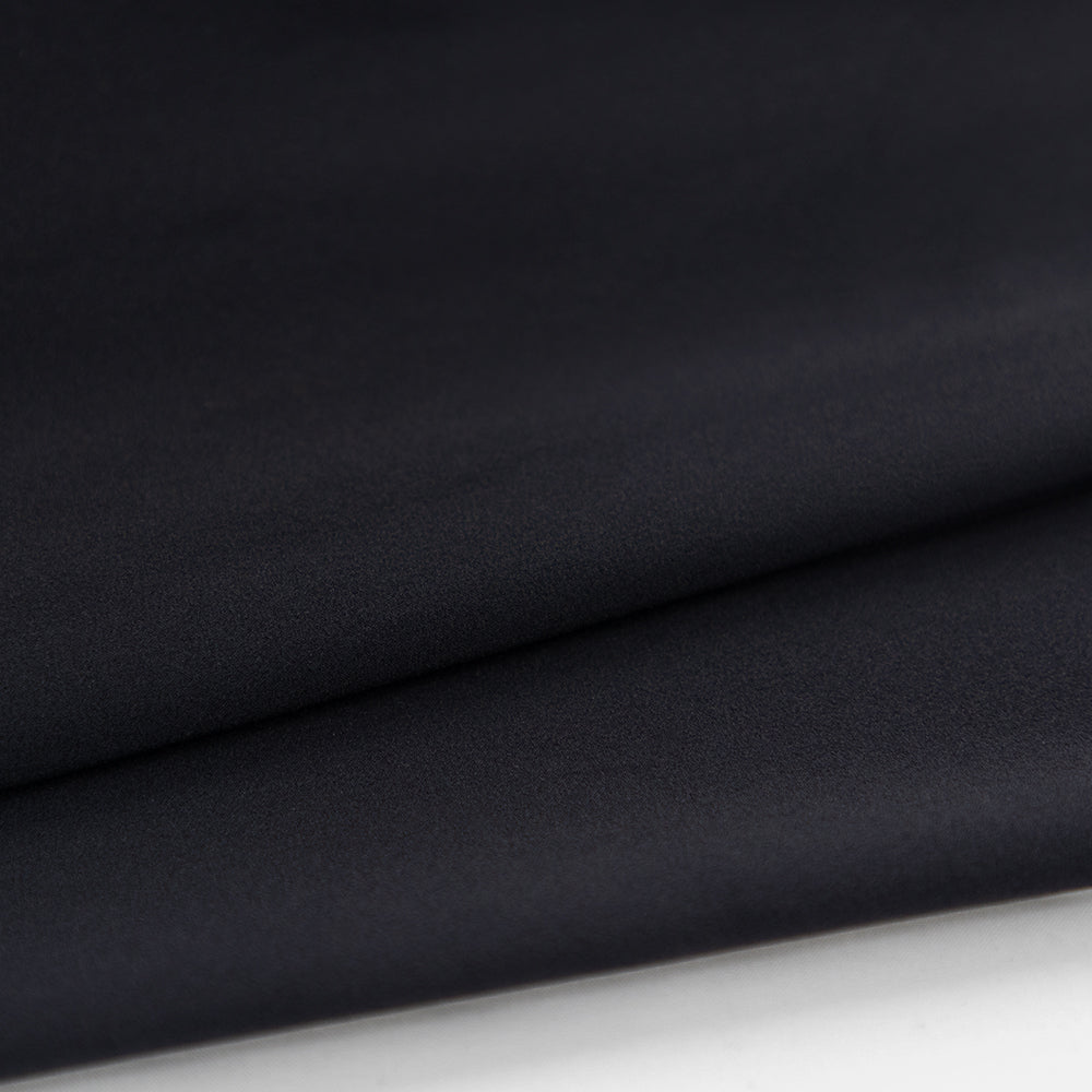 Close-up of VORTEX BLACK EDITION Tri-Suit fabric – ultra-light, high-stretch aero material