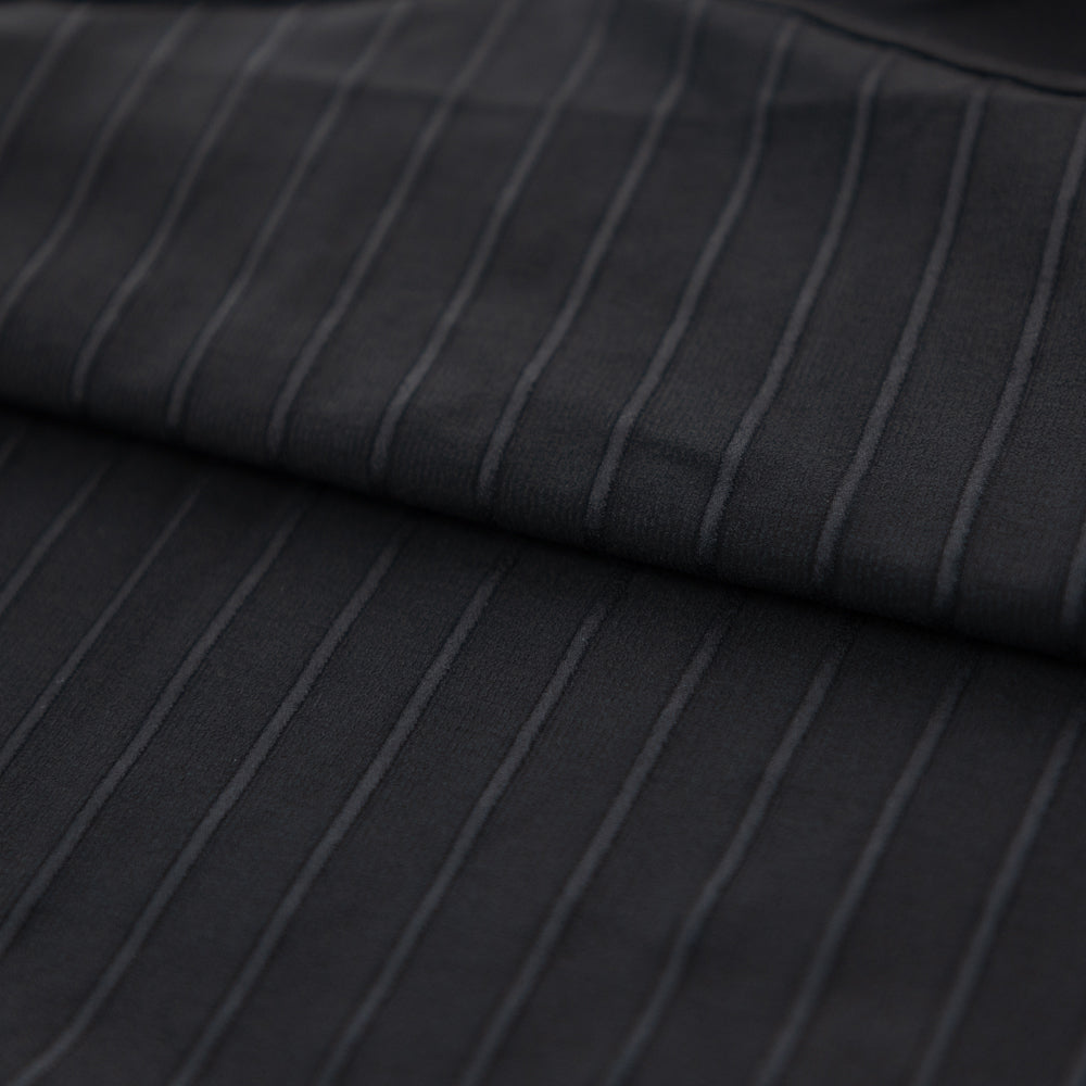Close-up of ribbed aero fabric on TRI-FIT VORTEX BLACK EDITION Tri-Suit – ultra-light aerodynamic material