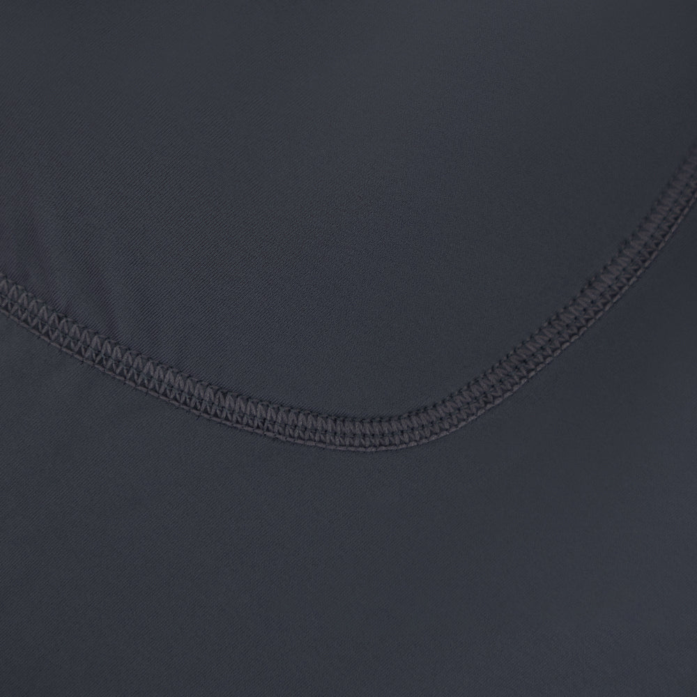 Close-up of stitching and panel construction on men’s VANGUARD tri-suit lower half in dark grey