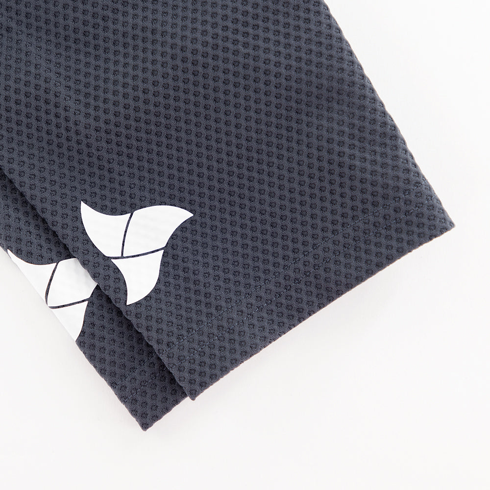 White TRI-FIT logo printed on grey mesh sleeve of VANGUARD tri-suit, with laser-cut hem
