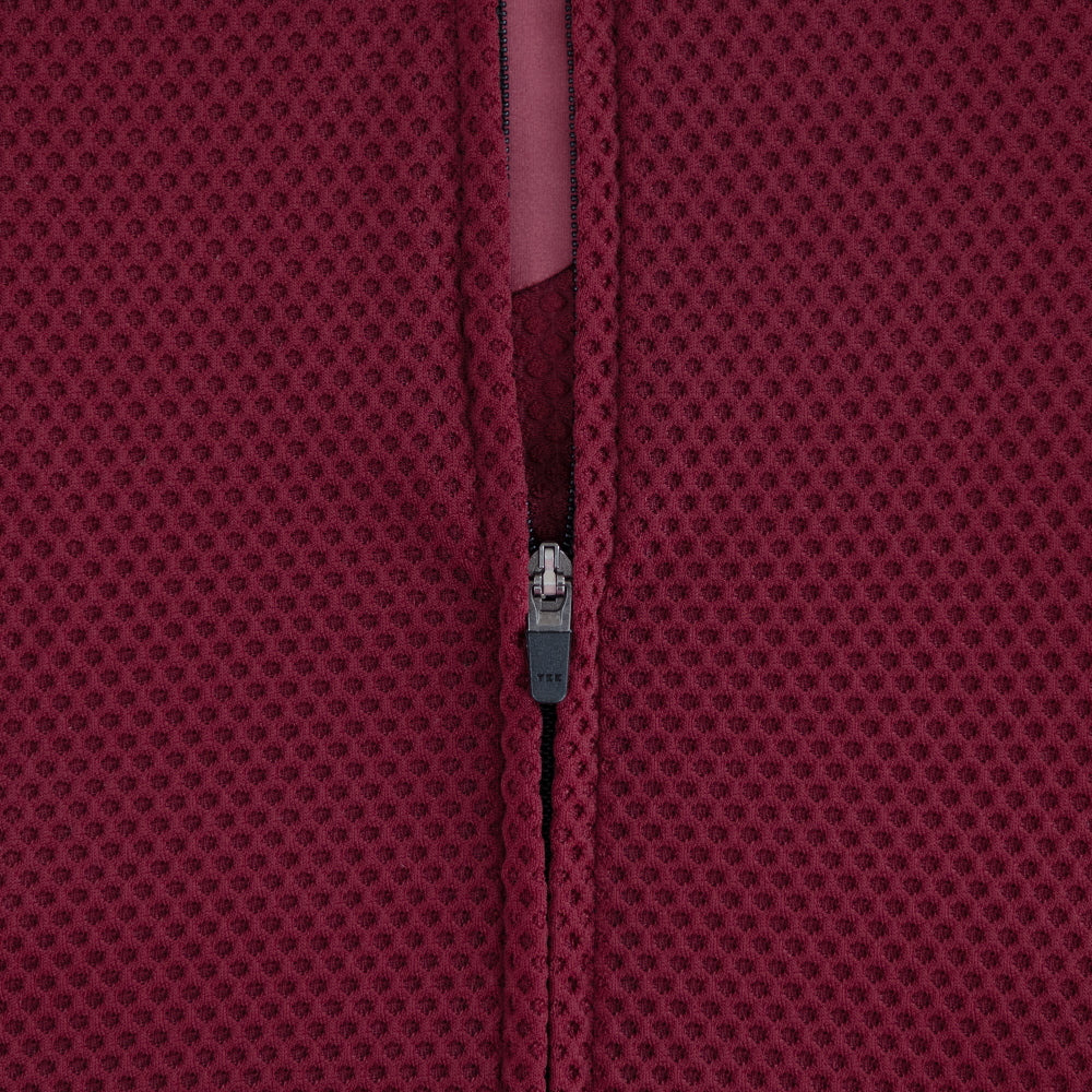 Detail of premium YKK zipper on TRI-FIT VANGUARD tri-suit front chest panel