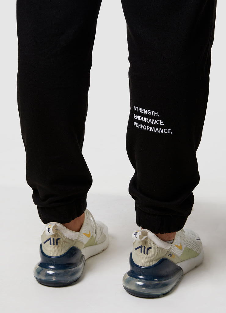 Woman wearing TRI-FIT Casualwear black joggers